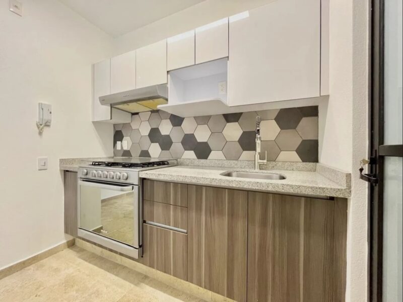 Departamento con patio privado y doble altura en Ciudad de los Deportes